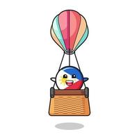 philippines flag mascot riding a hot air balloon vector