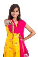 Beautiful Indian girl showing Rakhis on occasion of Raksha bandhan. Sister tie Rakhi as symbol of intense love for her brother. photo