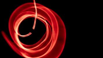 Glowing abstract curved red lines - Light painted 4K video timelapse