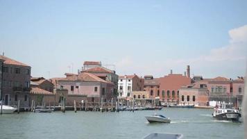 Venice streets and canals. Ships are sailing on the water in Summer video