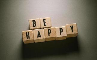 Be Happy Word with Wooden Cubes photo