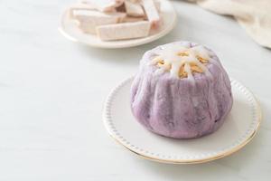 taro bun with white sugar cream and nut photo