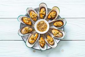 mussels with spicy seafood sauce photo