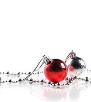 Christmas balls with ornaments on white background. photo