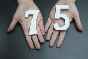 To female hands the figure of seventy-five.