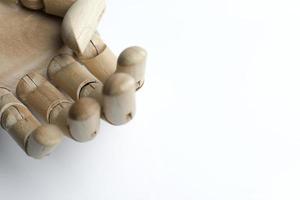 Wooden hand on a white background. photo