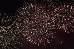 Fireworks in the night sky on a holiday. photo