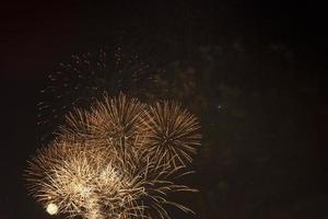 Fireworks in the night sky on a holiday. photo