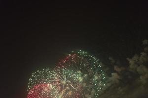 Fireworks in the night sky on a holiday. photo