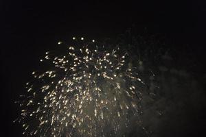 Fireworks in the night sky on a holiday. photo