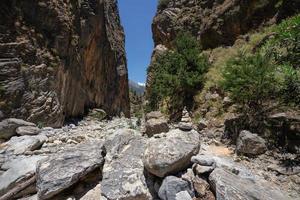 Trekking in Samaria Gorge on the island of Crete, Greece.