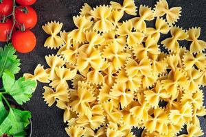 raw farfalle pasta cooking ingredient food background photo