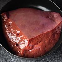 raw beef liver healthy meal food background photo