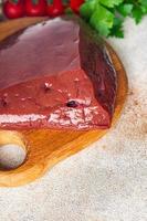 raw beef liver healthy meal food background photo