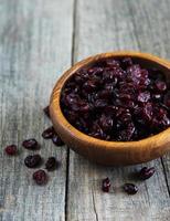 Dried cranberries on a table photo