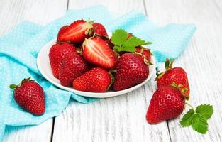 ripe strawberries on wooden table