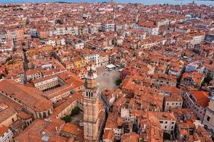 Beautiful orange roofs of Venice in Italy. Aerial view.