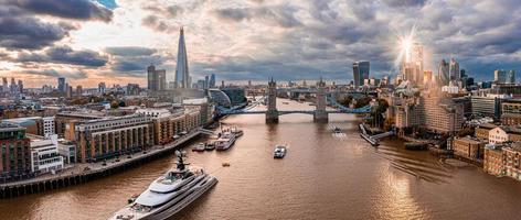 Aerial panoramic sunset view of London Tower Bridge and the River Thames photo