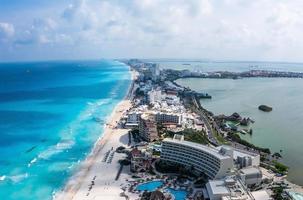 Aerial photos of luxury hotels and resorts surrounding beaches