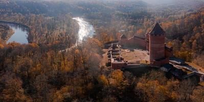 Aerial view of tthe Sigulda city in Latvia during golden autumn. photo