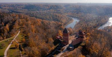 Aerial view of tthe Sigulda city in Latvia during golden autumn. photo