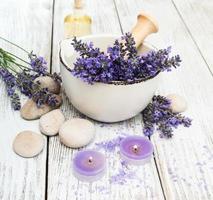 Spa products and lavender flowers photo