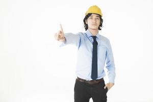 ingeniero, hombre, llevando, casco amarillo, blanco foto