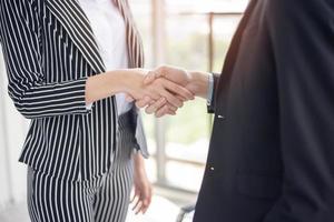 Business people are shaking hand photo