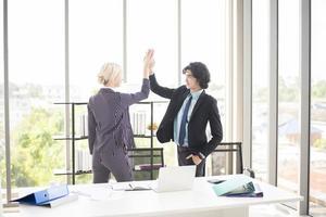 Business people are happy with business success in office photo