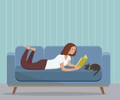 A young girl or woman reads a book in the living room. The girl is lying on the couch with a cat. Cozy living room interior in blue tones. Flat vector illustration