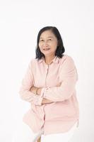 Asian older woman on white background photo