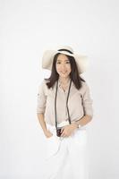 Beautiful Asian woman tourist  on white background photo