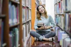 Happy young Asian University student. photo