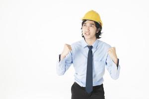 ingeniero, hombre, llevando, casco amarillo, blanco foto