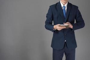 Close up of business man is using tablet photo