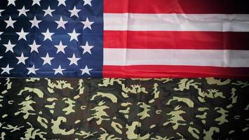 American flag and Military camouflage pattern. Top view angle. photo