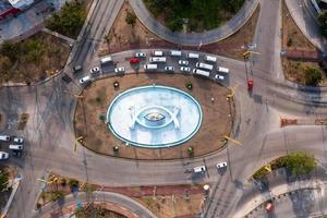 Top down aerial view of a traffic roundabout photo