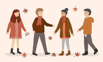 Young  man and women in winter fashion clothes vector