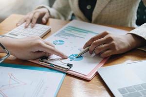 Close up Business people meeting to discuss the situation on the market. Business Financial Concept photo