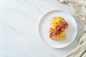 bread toast with scramble egg and bacon photo