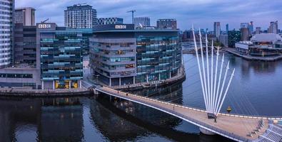 Aerial view of the Media City UK is on the banks of the Manchester at dusk photo