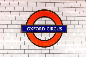 Underground Oxford Circus tube station sign in London. photo