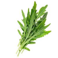 Arugula leaves isolated on white background. Closeup fresh wild rocket leaves on white background top view. photo