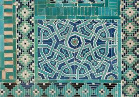 asian old ceramic mosaic. elements of oriental ornament on ceramic tiles photo