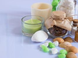 set ingredients and spice for aromatherapy and body care on a white surface with reflection. SPA still life photo