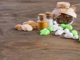 set ingredients and spice for aromatherapy and body care on wooden surface. SPA still life photo
