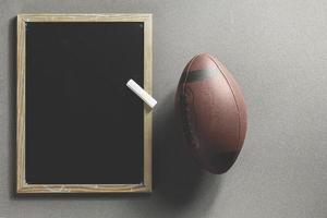 american football ball blackboard photo