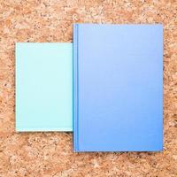 blue notebooks wooden desk photo
