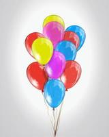 Vector realistic shiny multicolored balloons isolated on a light background.