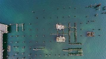 Aerial photo of piers and water markers in abandoned harbor